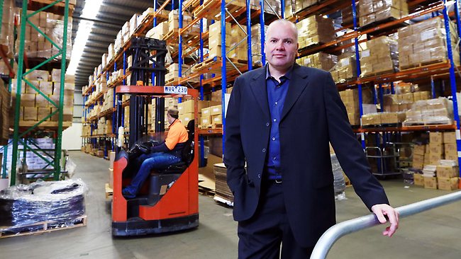 aaron poole standing with forklift